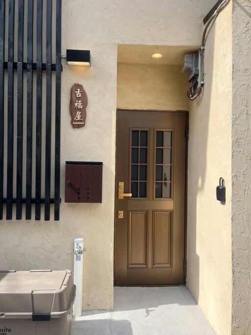 Villa 吉福屋/机场直达/3分步行地铁jr/14分usj/心斋桥/難波 à Ōsaka Extérieur photo