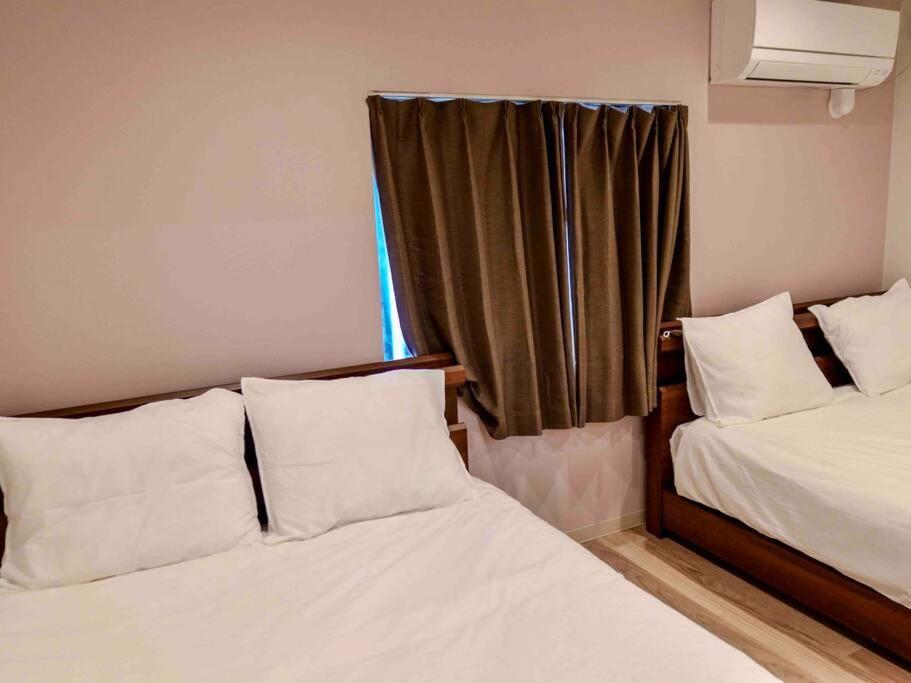 Villa 吉福屋/机场直达/3分步行地铁jr/14分usj/心斋桥/難波 à Ōsaka Extérieur photo