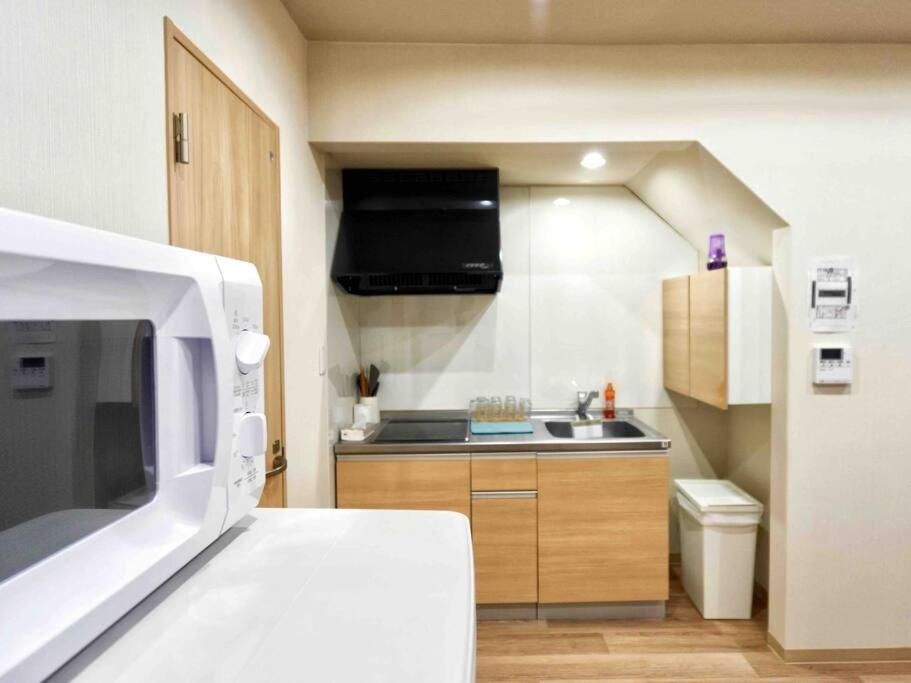 Villa 吉福屋/机场直达/3分步行地铁jr/14分usj/心斋桥/難波 à Ōsaka Extérieur photo